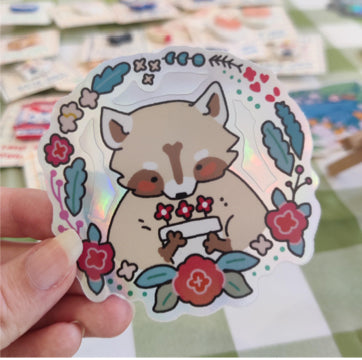 Holo flower raccoon sticker - illuroses