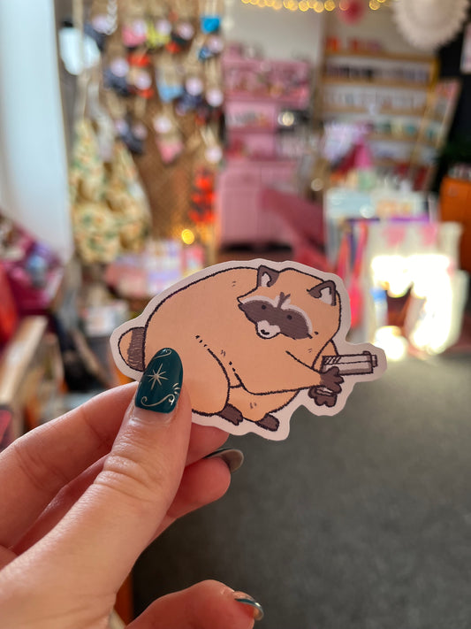 Holo gun raccoon sticker - illuroses